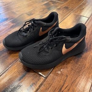 Nike Black Running Shoes with Copper Swoosh, Size 8.5 US